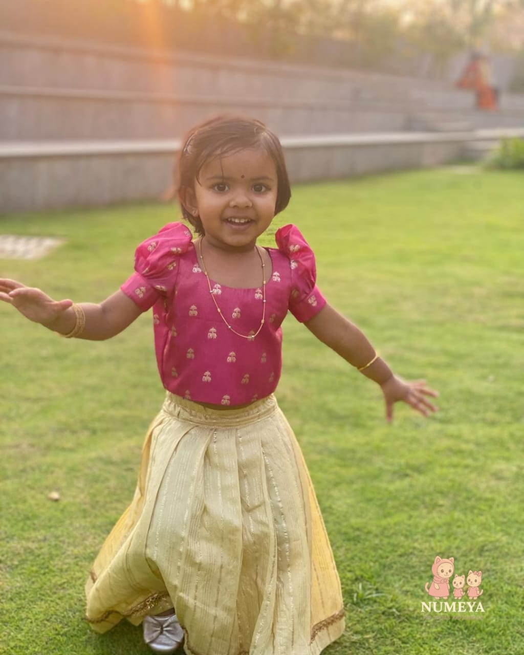 Girl's Festive Onion Pink Tissue Brocade Top and Golden Semi Chanderi Skirt